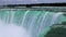 Horseshoe fall Niagara - The edge of the waterfall - water flows into a cliff - a strong flow of water close up.