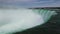 Horseshoe fall Niagara - The edge of the waterfall - water flows into a cliff - a strong flow of water close up.