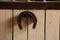 Horseshoe horse on the board in the stables closeup