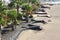 Horseshoe walls shelter sunbathers from wind blown sand