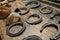 Horseshoes and hoofs of different sizes and materials