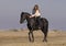 Horsewoman on the beach