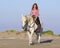 Horsewoman on the beach