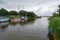 HORSEY MERE, NORFOLK/UK - AUGUST 6 : Boats moored on the approach to Horsey Mere in the Norfolk Broads on August 6, 2008