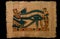 Horus ancient eye on papyrus paper