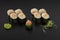 Hosomaki sushi rolls decorated with wasabi