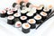 Hosomaki sushi set on white plate. Traditional japanese sushi rolls