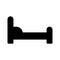 Hospital bed glyph vector icon