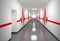 Hospital corridor with red pulse lines on walls