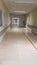 Hospital corridor windows doors benches for background