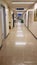 Hospital corridor windows doors benches for background