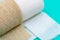 Hospital Grade Sterile Rolled Gauze and Elastic Self-Adhering Compression Bandage Cohesive Bandage on green