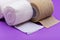 Hospital Grade Sterile Rolled Gauze and Elastic Self-Adhering Compression Bandage Cohesive Bandage on purple