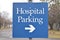 Hospital Parking Sign With Arrow Blue In Color