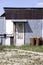 Hostel, Old barn, metal building house. There are some old rusty gas cylinders nearby. Slum