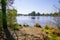 Hostens sandy beach access lake with calm water in gironde france