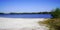 Hostens sandy beach lake with calm water in gironde france