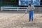 Hostler aligns sand just before The Cup dressage and jumping A.V. Nikulin memory