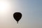 Hot Air ballon over the cloud during sunset