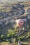 Hot air ballon over Love Valley near Goreme and Nevsehir in the center of Cappadocia, Turkey region of Anatolia