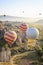 Hot air ballons over Love Valley near Goreme and Nevsehir in the center of Cappadocia, Turkey region of Anatolia.