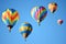 Hot Air Balloon Adventure. Colorful balloons soaring against a clear sky