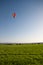 Hot air balloon, blue sky, wheat