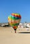 Hot air balloon on the Chorrillo Rompidillo beach in Rota, Costa de la Luz Cadiz, Spain.