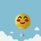 Hot air balloon Emoji Emoticon flying with clouds on sky, traveling concept, Cute smiling emoticon.