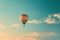 A hot air balloon gracefully flies through the clear blue sky, offering a stunning view of the aerial adventure, A plainly colored