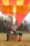 A hot air balloon is heated just before take off.