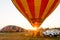 A hot air balloon is heated just before take off.