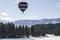 Hot air balloon over cross-country skiing