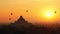 Hot air balloon over plain of Bagan at sunrise, Myanmar