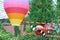 Hot air balloon and red plane