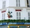 Hot air balloon sculpture above a cafe in Paris