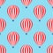 Hot air balloon seamless pattern. Baby shower vector illustrations on blue sky background.