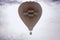 A hot air balloon soars above