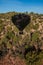 Hot air ballooning over sedona Arizona showing balloon and butte