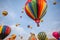 Hot-air balloons with blue sky and clouds background