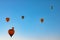 Hot Air Balloons on the clear sky at sunrise. Hot air balloon festival photo.