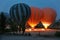 Hot Air Balloons With Fire Lights Before Flying In Early Morning