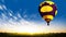 Hot air balloons flies in blue sky