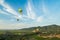 Hot Air Balloons Floating Above Vineyards