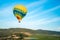 Hot Air Balloons Floating Above Vineyards