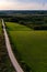 Hot air balloons flying above country roads fields and forests in Lithuania