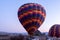 The hot air balloons flying above Goreme park, Sunrise time, Cappadocia, Turkey