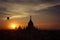 Hot air balloons flying over Buddhist Temples at Bagan. Myanmar