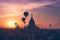 Hot air balloons flying over Buddhist Temples at Bagan. Myanmar