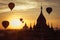 Hot air balloons flying over Buddhist Temples at Bagan. Myanmar
